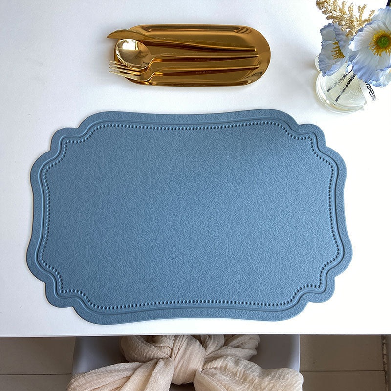 4 pcs Retro Faux Leather Placemat – Waterproof & Oil-Proof Dining Table Mat (Light blue)
